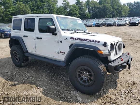 2023 Jeep Wrangler Rubicon with VIN 1C4HJXFN2PW639838, listed as a Copart auction lot 65577515 with 26,203 mi miles and Salvage title. Bid and sale history available at DreamBid. Image 4.