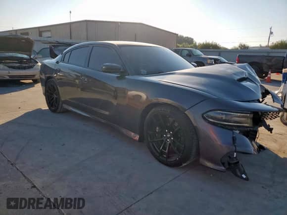 2021 Dodge Charger Scat Pack Widebody z VIN 2C3CDXGJ7MH540721, wystawiony jako Copart lot #84951435 z przebiegiem 78 107 mil mil oraz Szkoda całkowita • Salvage title. Historia ofert i sprzedaży dostępna na DreamBid. Obrazek 4.