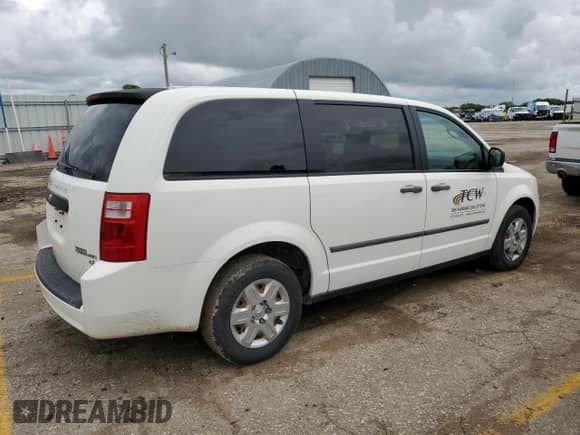 2010 Dodge Grand Caravan Cargo with VIN 2D4CN1AE6AR248763, listed as a Copart auction lot 55362704 with 103,671 mi miles and Salvage title. Bid and sale history available at DreamBid. Image 3.