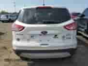 2014 Ford Escape SE с VIN 1FMCU0GX1EUB78726, выставлен на аукционе Copart как лот 81021325 с пробегом 161 108 миль миль и Списание • Salvage title. История ставок и продаж доступна на DreamBid. Изображение 6.