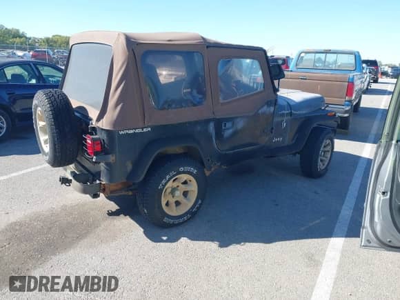 1994 Jeep Wrangler S with VIN 1J4FY19P2RP438316, listed as a IAAI auction lot 43497863 with 111,657 mi miles and . Bid and sale history available at DreamBid. Image 4.
