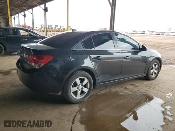 2014 Chevrolet Cruze 1LT z VIN 1G1PC5SB6E7358826, wystawiony jako Copart lot #86479605 z przebiegiem 130 165 mil mil oraz Szkoda całkowita • Salvage title. Historia ofert i sprzedaży dostępna na DreamBid. Obrazek 3.