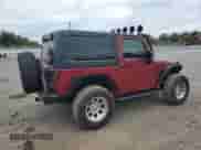 2012 Jeep Wrangler Sport with VIN 1C4AJWAG7CL105511, listed as a Copart auction lot 62822985 with 137,520 mi miles and Clean title. Bid and sale history available at DreamBid. Image 3.