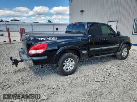 2004 Toyota Tundra SR5 z VIN 5TBBT44124S442610, wystawiony jako Copart lot #70451445 z przebiegiem 258 271 mil mil oraz Czysty tytuł • Clean title. Historia ofert i sprzedaży dostępna na DreamBid. Obrazek 3.