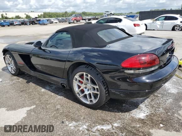 2003 Dodge Viper SRT-10 с VIN 1B3JR65Z43V500286, выставлен на аукционе Copart как лот 62396915 с пробегом 62 198 миль миль и Списание • Salvage title. История ставок и продаж доступна на DreamBid. Изображение 2.