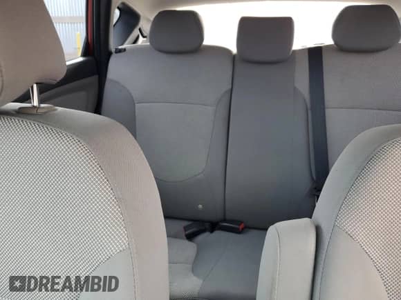 2013 Hyundai Accent GS z VIN KMHCT5AE4DU083907, wystawiony jako Copart lot #71919105 z przebiegiem 124 190 mil mil oraz Szkoda całkowita • Salvage title. Historia ofert i sprzedaży dostępna na DreamBid. Obrazek 10.