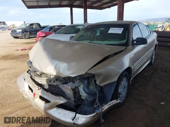 2001 Pontiac Grand Am SE z VIN 1G2NE52T81M582634, wystawiony jako IAAI lot #42652160 z przebiegiem Nie podano mil oraz . Historia ofert i sprzedaży dostępna na DreamBid. Obrazek 2.