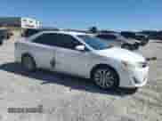 2012 Toyota Camry XLE z VIN 4T1BD1FK8CU022512, wystawiony jako Copart lot #82413865 z przebiegiem Nie podano mil oraz Szkoda całkowita • Salvage title. Historia ofert i sprzedaży dostępna na DreamBid. Obrazek 4.