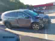 2014 Honda CR-V EX-L with VIN 2HKRM4H73EH704207, listed as a IAAI auction lot 43106801 with 132,005 mi miles and . Bid and sale history available at DreamBid. Image 13.