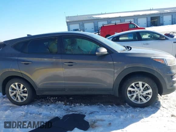 2021 Hyundai Tucson SE with VIN KM8J23A48MU343991, listed as a IAAI auction lot 41355432 with 53,310 mi miles and . Bid and sale history available at DreamBid. Image 13.