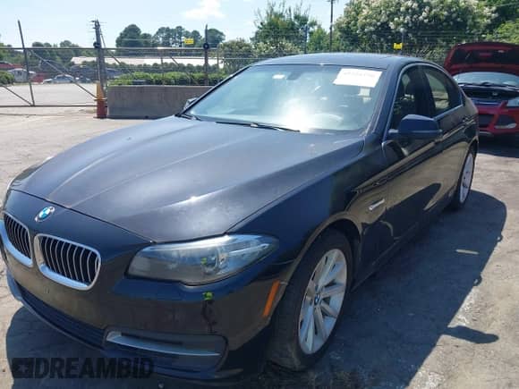 2014 BMW 5 Series 535d with VIN WBAXA5C52ED689410, listed as a IAAI auction lot 42554790 with 136,744 mi miles and . Bid and sale history available at DreamBid. Image 2.