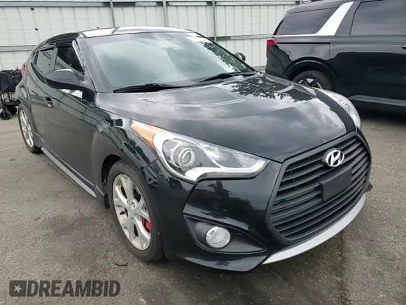 2014 Hyundai Veloster Turbo R-Spec с VIN KMHTC6AE9EU209637, выставлен на аукционе Copart как лот 67860545 с пробегом 112 479 миль миль и Списание • Salvage title. История ставок и продаж доступна на DreamBid. Изображение 13.
