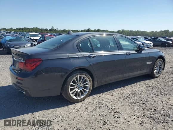 2013 BMW 7 Series 750Li xDrive with VIN WBAYF8C58DD140400, listed as a Copart auction lot 67965195 with 153,384 mi miles and Clean title. Bid and sale history available at DreamBid. Image 3.