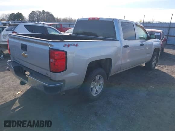 2014 Chevrolet Silverado 1500 LT z VIN 3GCUKREC9EG141445, wystawiony jako IAAI lot #41357325 z przebiegiem 158 604 mil mil oraz . Historia ofert i sprzedaży dostępna na DreamBid. Obrazek 4.