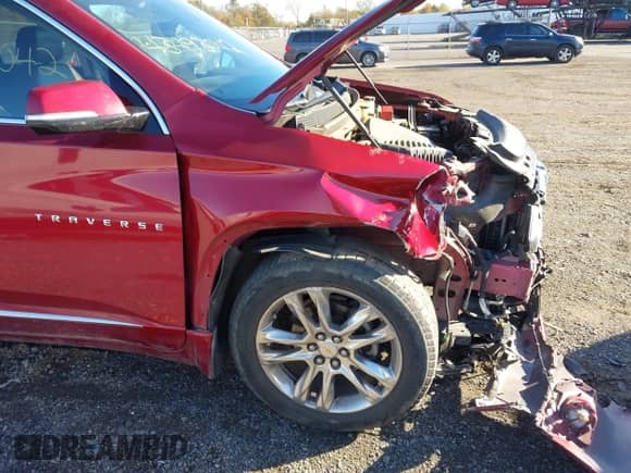 2018 Chevrolet Traverse High Country z VIN 1GNEVKKW1JJ119649, wystawiony jako IAAI lot #43493042 z przebiegiem 92 101 mil mil oraz . Historia ofert i sprzedaży dostępna na DreamBid. Obrazek 17.