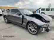 2014 Ford Mustang GT with VIN 1ZVBP8CF0E5299323, listed as a Copart auction lot 69133585 with 56,162 mi miles and Salvage title. Bid and sale history available at DreamBid. Image 4.