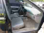 1994 Chevrolet Caprice LS z VIN 1G1BN52P1RR181726, wystawiony jako IAAI lot #39920828 z przebiegiem 115 128 mil mil oraz . Historia ofert i sprzedaży dostępna na DreamBid. Obrazek 5.