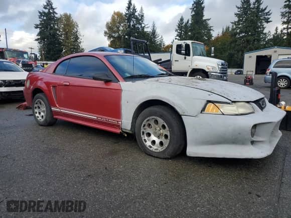 2000 Ford Mustang z VIN 1FAFP4045YF230261, wystawiony jako Copart lot #86141975 z przebiegiem Nie podano mil oraz Czysty tytuł • Clean title. Historia ofert i sprzedaży dostępna na DreamBid. Obrazek 4.