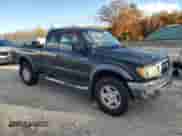 2001 Toyota Tacoma with VIN 5TEWN72N81Z873896, listed as a Copart auction lot 82741565 with 186,530 mi miles and Clean title. Bid and sale history available at DreamBid. Image 4.