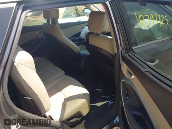 2016 Hyundai Santa Fe z VIN 5XYZUDLB6GG306186, wystawiony jako IAAI lot #42797325 z przebiegiem 53 410 mil mil oraz . Historia ofert i sprzedaży dostępna na DreamBid. Obrazek 8.