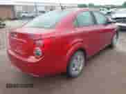 2014 Chevrolet Sonic LS with VIN 1G1JA5SH0E4130239, listed as a IAAI auction lot 42193639 with 124,503 mi miles and . Bid and sale history available at DreamBid. Image 4.