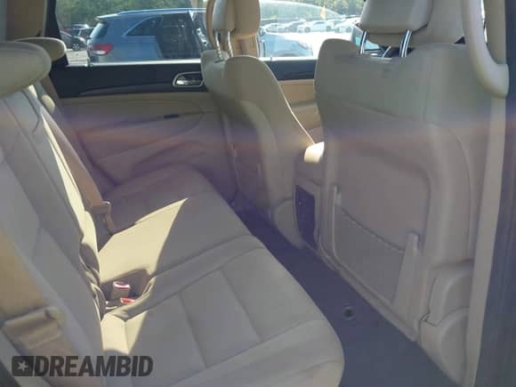 2018 Jeep Grand Cherokee Altitude with VIN 1C4RJEAGXJC247040, listed as a IAAI auction lot 42928303 with 84,955 mi miles and . Bid and sale history available at DreamBid. Image 8.