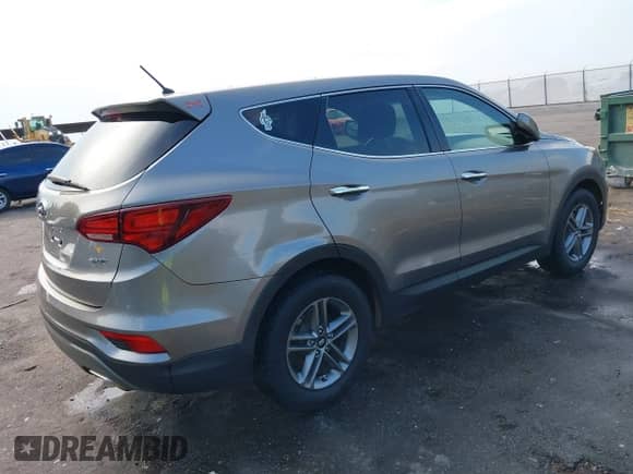 2018 Hyundai Santa Fe 2.4L with VIN 5NMZT3LBXJH095908, listed as a IAAI auction lot 43237115 with 134,010 mi miles and . Bid and sale history available at DreamBid. Image 4.