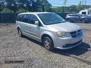 2011 Dodge Grand Caravan Crew with VIN 2D4RN5DGXBR657364, listed as a IAAI auction lot 42952703 with Not provided miles and . Bid and sale history available at DreamBid. Image 1.