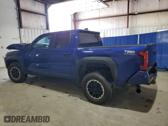 2024 Toyota Tacoma TRD Off Road with VIN 3TMLB5JN6RM026286, listed as a Copart auction lot 81666825 with 27,497 mi miles and Salvage title. Bid and sale history available at DreamBid. Image 2.