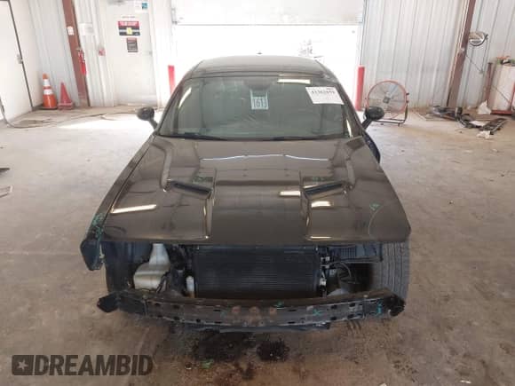 2015 Dodge Challenger SXT Plus z VIN 2C3CDZBG4FH705425, wystawiony jako IAAI lot #43362659 z przebiegiem Nie podano mil oraz . Historia ofert i sprzedaży dostępna na DreamBid. Obrazek 12.