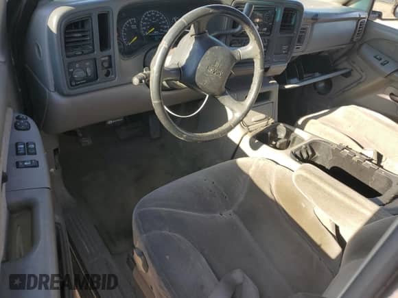2000 GMC Sierra 1500 SLE with VIN 2GTEC19T9Y1255052, listed as a Copart auction lot 83404594 with 215,996 mi miles and Salvage title. Bid and sale history available at DreamBid. Image 8.
