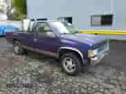 1995 Nissan Frontier XE with VIN 1N6SD16S2SC399696, listed as a Copart auction lot 76833194 with 144,999 mi miles and Salvage title. Bid and sale history available at DreamBid. Image 4.