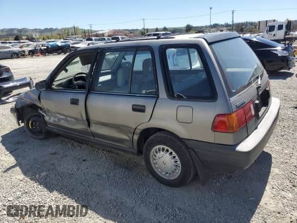 1990 Honda Civic with VIN JHMEE2752LS001520, listed as a Copart auction lot 50095545 with 456,252 mi miles and Salvage title. Bid and sale history available at DreamBid. Image 2.