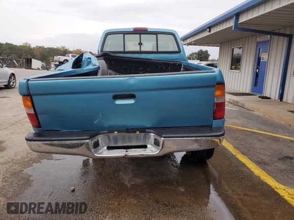 1997 Toyota Tacoma z VIN 4TAWM72NXVZ296658, wystawiony jako Copart lot #78831984 z przebiegiem 228 827 mil mil oraz Szkoda całkowita • Salvage title. Historia ofert i sprzedaży dostępna na DreamBid. Obrazek 6.
