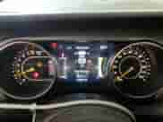 2021 Jeep Wrangler Unlimited Sport S with VIN 1C4HJXDG1MW738845, listed as a Copart auction lot 63879395 with 61,501 mi miles and Salvage title. Bid and sale history available at DreamBid. Image 9.