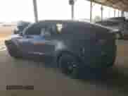2021 Tesla Model Y Long Range with VIN 5YJYGDEE7MF206059, listed as a Copart auction lot 80559965 with 77,329 mi miles and Salvage title. Bid and sale history available at DreamBid. Image 2.