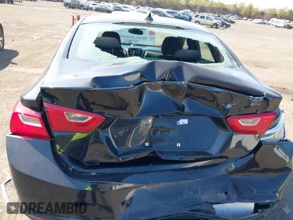 2018 Chevrolet Malibu LT z VIN 1G1ZD5ST3JF152636, wystawiony jako IAAI lot #43212615 z przebiegiem 135 976 mil mil oraz . Historia ofert i sprzedaży dostępna na DreamBid. Obrazek 6.