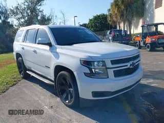 2019 Chevrolet Tahoe LS with VIN 1GNSCAKC1KR119209, listed as a IAAI auction lot 41405837 with 102,300 mi miles and . Bid and sale history available at DreamBid. Image 1.