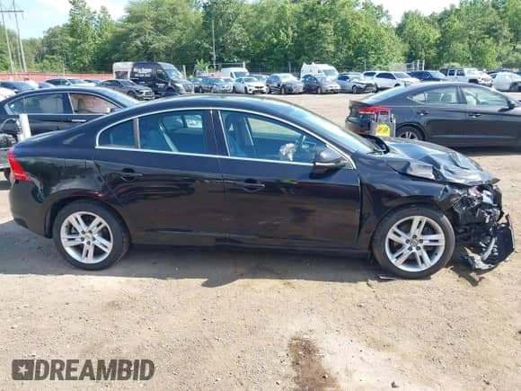2015 Volvo S60 T5 Drive-E Premier with VIN YV126MFK1F1357935, listed as a IAAI auction lot 42812237 with 105,669 mi miles and . Bid and sale history available at DreamBid. Image 13.