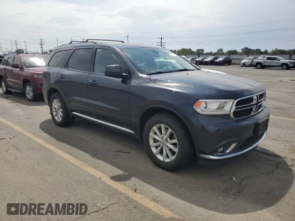 2014 Dodge Durango SXT with VIN 1C4RDJAG5EC539717, listed as a Copart auction lot 70519855 with 116,632 mi miles and Salvage title. Bid and sale history available at DreamBid. Image 4.