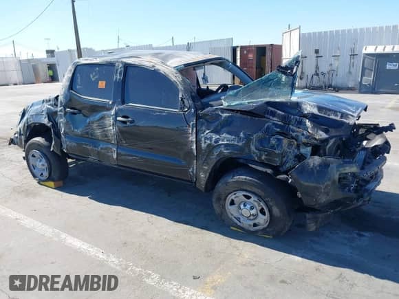 2022 Toyota Tacoma SR with VIN 3TYAX5GNXNT053716, listed as a IAAI auction lot 42853297 with 42,989 mi miles and . Bid and sale history available at DreamBid. Image 1.