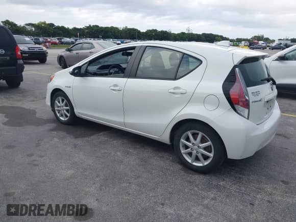 2015 Toyota Prius One z VIN JTDKDTB39F1095411, wystawiony jako IAAI lot #43571290 z przebiegiem 77 477 mil mil oraz . Historia ofert i sprzedaży dostępna na DreamBid. Obrazek 3.