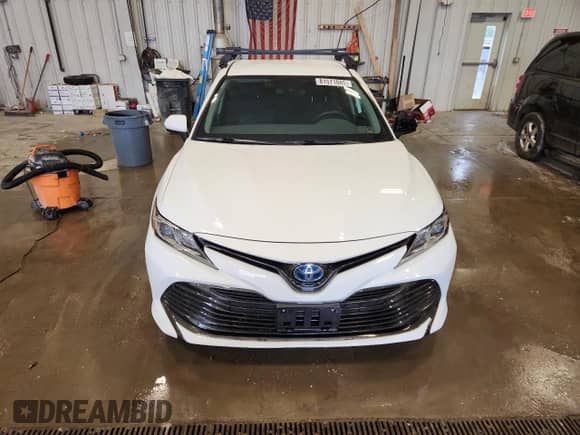 2019 Toyota Camry Hybrid LE с VIN 4T1B31HK3KU006491, выставлен на аукционе Copart как лот 81571085 с пробегом 83 074 миль миль и Списание • Salvage title. История ставок и продаж доступна на DreamBid. Изображение 5.