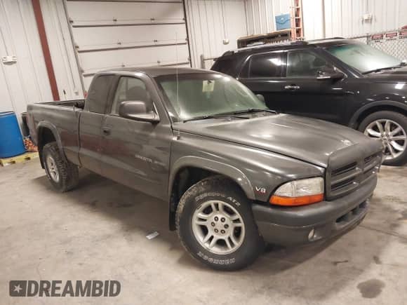 2002 Dodge Dakota Sport с VIN 1B7GG32N32S509012, выставлен на аукционе IAAI как лот 41306952 с пробегом 159 108 миль миль и . История ставок и продаж доступна на DreamBid. Изображение 1.