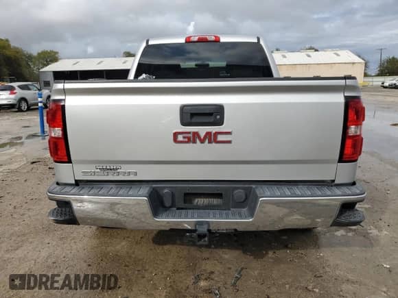 2017 GMC Sierra 1500 with VIN 3GTP1LEH2HG352449, listed as a Copart auction lot 84054074 with 61,502 mi miles and Salvage title. Bid and sale history available at DreamBid. Image 6.