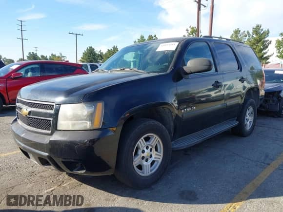 2007 Chevrolet Tahoe LS with VIN 1GNFC13C27R347789, listed as a IAAI auction lot 43595543 with 255,773 mi miles and . Bid and sale history available at DreamBid. Image 2.