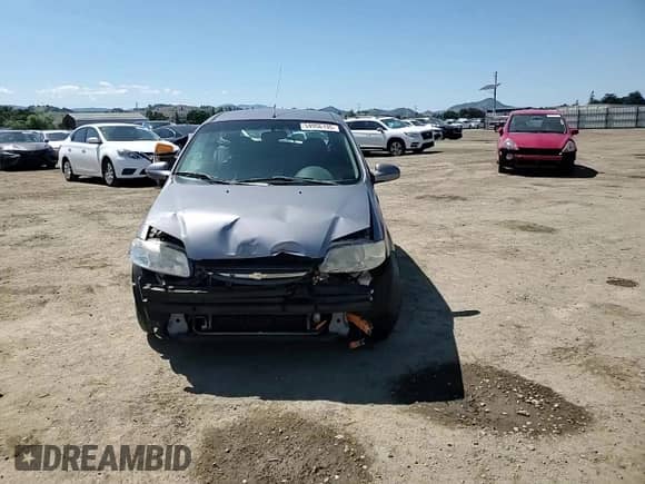 2006 Chevrolet Aveo LT with VIN KL1TG66666B669658, listed as a Copart auction lot 54956195 with 101,441 mi miles and Salvage title. Bid and sale history available at DreamBid. Image 14.