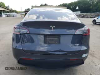 2021 Tesla Model Y Long Range with VIN 5YJYGDEE5MF257320, listed as a Copart auction lot 63980974 with 89,016 mi miles and Salvage title. Bid and sale history available at DreamBid. Image 6.