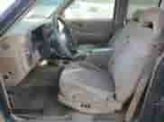 1996 Chevrolet Blazer with VIN 1GNDT13W3T2262402, listed as a Copart auction lot 62677515 with 168,312 mi miles and Salvage title. Bid and sale history available at DreamBid. Image 7.