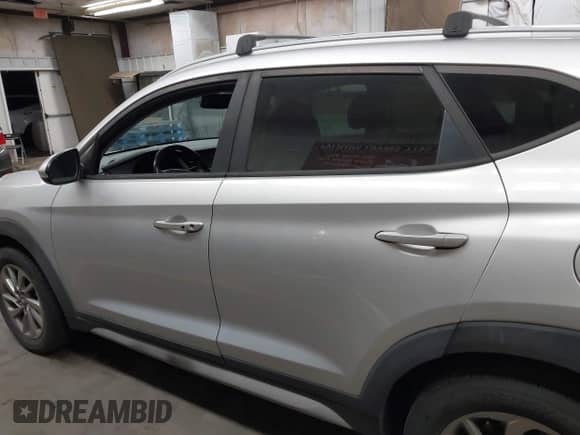 2017 Hyundai Tucson SE with VIN KM8J33A4XHU418628, listed as a IAAI auction lot 42991252 with 96,322 mi miles and . Bid and sale history available at DreamBid. Image 14.